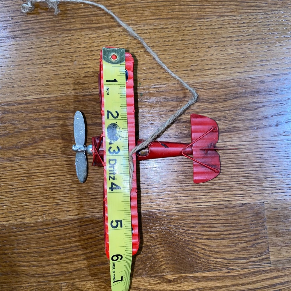 Hanging red metal airplane